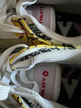 Airwalk White Sneakers with Yellow Floral Accents and Pink Tongue Tag